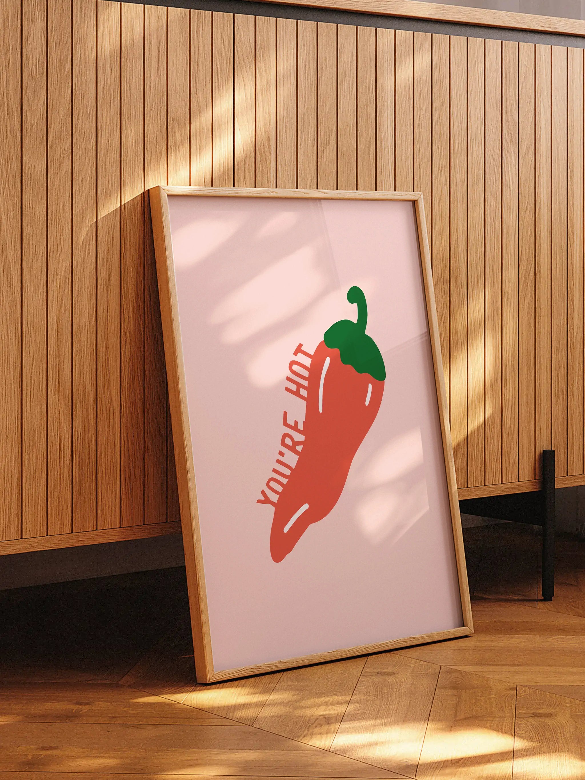 Minimalist kitchen wall art featuring a spicy pepper illustration